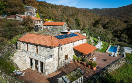 A detached village house with private grounds 